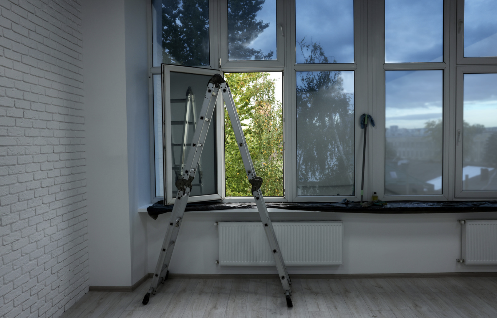 Cleaning on a ladder